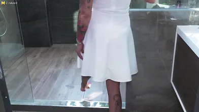 kinky MILF playing with herself in the shower