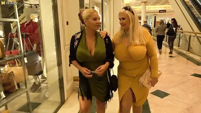 Two big breasted mature ladies shopping for toys