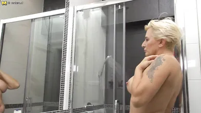 This housewife loves playing with her pussy in the shower