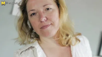 Horny blonde mama sucking cock