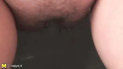 Chubby blonde housewife getting wet